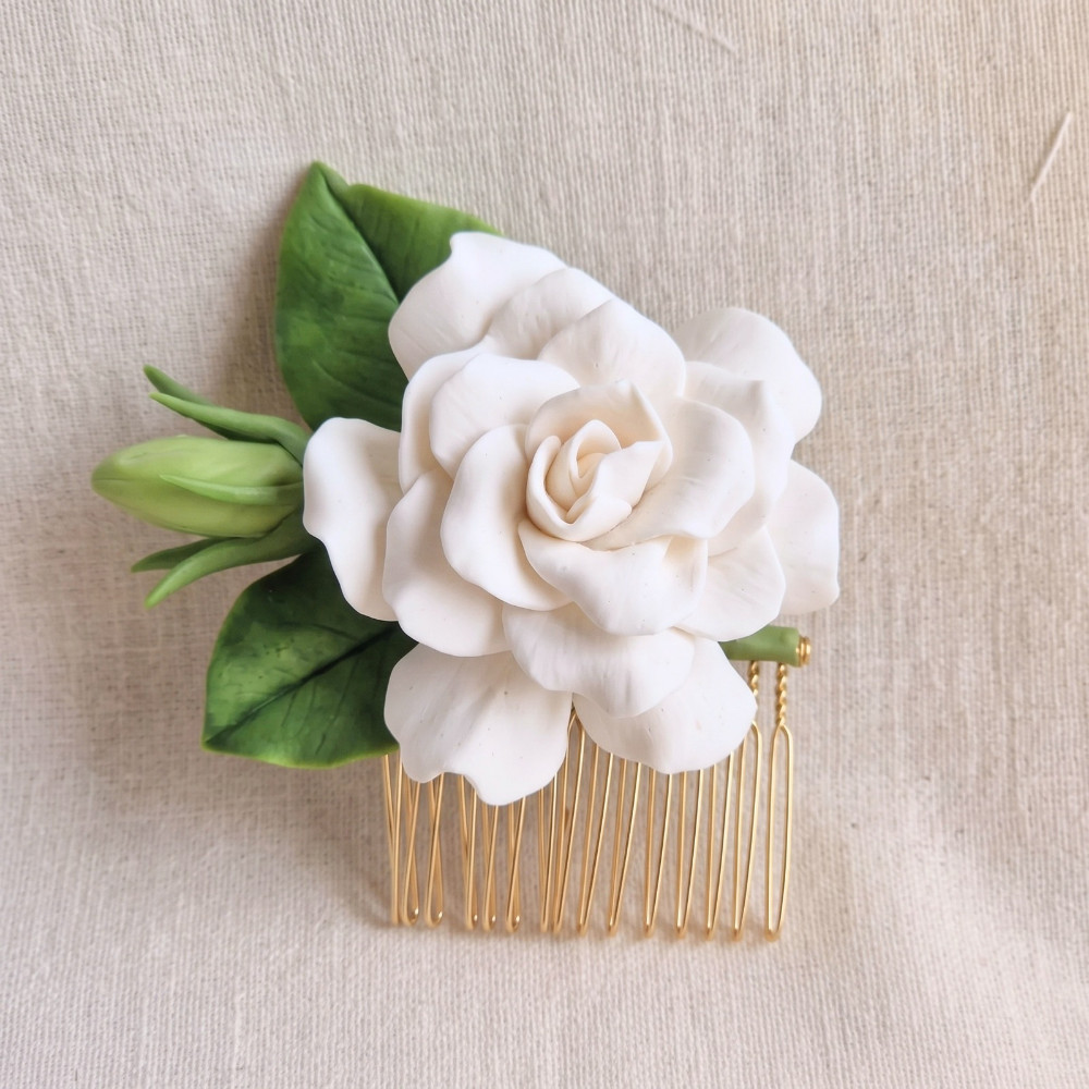 Ivory White cold porcelain gardenia bridal hair comb with green leaves and buds on a gold comb
